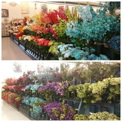 Hobby Lobby - Tons of flower choices of every color of the spectrum.