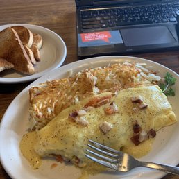 Turkey omelet with hollandaise sauce with hash browns!