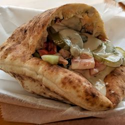 Rami's - Falafel Hummus Pita with the works and zchug (Israel hot sauce.) Best falafel in Greater Boston and maybe anywhere.