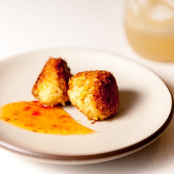 EatWith - a plate of food on a table - Supper Clubs Near Me EatWith - a plate of food on a table - Supper Clubs Near Me