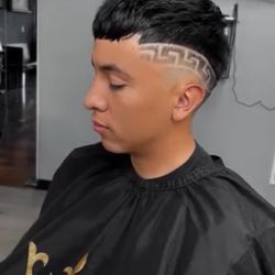 Throne Barber Studio - Haircut and design by Victor. Instagram fademeupvic
