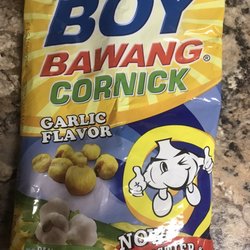 Toucan International Grociers - Real garlic pieces with corn that's popped. A bit hard and crunchy for those with sensitive teeth but the flavor is good. $1.99