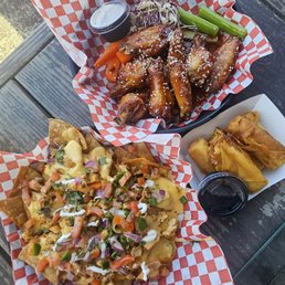 All on happy hour menu! Honey siracaha wings, veggie rolls, and chicken nachos All on happy hour menu! Honey siracaha wings, veggie rolls, and chicken nachos