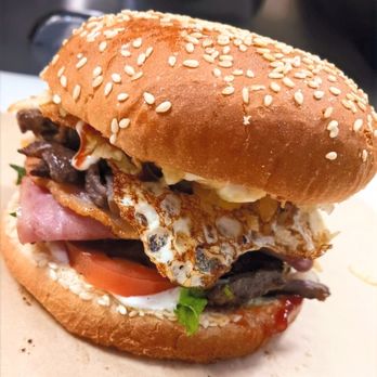 Panpanccs - Combo (Parriburguer,papas y soda)
(Ground beef, Grill Beef, Egg, Fried cheese, Bacon, Ham, French fries, Vegetables.) - Venezuelan Near Me - Las Vegas, Nevada