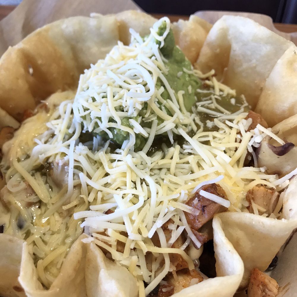 I filled in this taco bowl with brown rice - black beans - grilled chicken- guac - shredded cheese I filled in this taco bowl with brown rice - black beans - grilled chicken- guac - shredded cheese