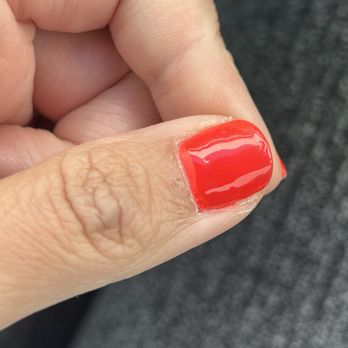 Diamond Nail Salon - gel mani-- top coat clearly not covering the polish.... on the bottom or the left - Nail Salons Near Me - Lompoc, California