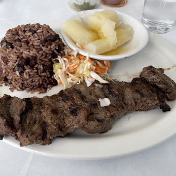 Fritanga - Carne asada with gallo pinto and Yuca al Mojo de Ajo. - Latin American Near Me - Saint Louis, Missouri Fritanga - Carne asada with gallo pinto and Yuca al Mojo de Ajo. - Latin American Near Me - Saint Louis, Missouri