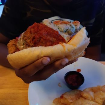 Garage 75 - Chicken parm big as hell. Homemade chips are excellent. - Bars Near Me - Charleston, South Carolina