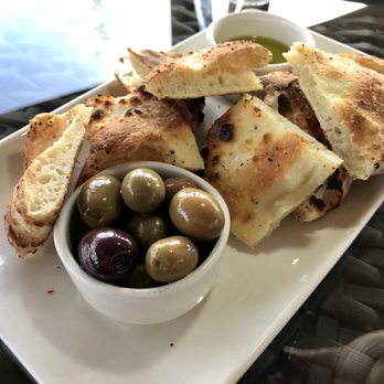 Two Sisters Vineyards - Warm Toasty Focaccia Bread with an Assortment of Oives and Olive Oil. - Wine Tours Near Me - Niagara-on-the-Lake, Ontario