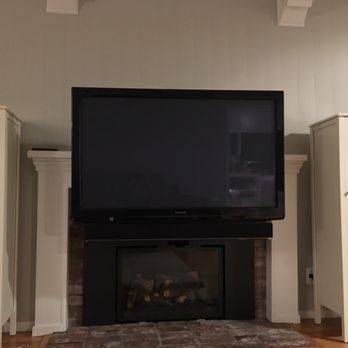 Custom Plasma Install - Pulled down to eye level. Awesome - Home Theatre Installation Near Me - Orlando, Florida