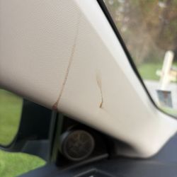 Car Spa - Dirty window frame.