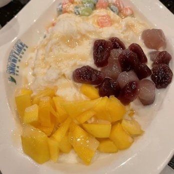Snowflake Tea House - shaved ice; with Mochi balls (one was taro flavor), mango slices, and condensed milk drizzle - Desserts Near Me - Duluth, Georgia Snowflake Tea House - shaved ice; with Mochi balls (one was taro flavor), mango slices, and condensed milk drizzle - Desserts Near Me - Duluth, Georgia
