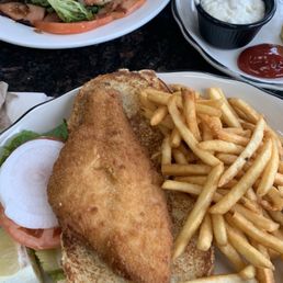 Cobb salad & fish on a bun with fries