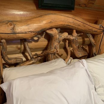 Hibernation Station - Headboard with all kind of stuff to poke you in the head while you're trying to sleep - Hotels Near Me - West Yellowstone, Montana Hibernation Station - Headboard with all kind of stuff to poke you in the head while you're trying to sleep - Hotels Near Me - West Yellowstone, Montana