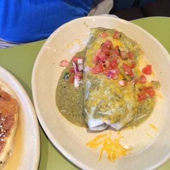 Snooze, an A.M. Eatery - Huge breakfast burrito with beans, egg, green chili And cheese - Breakfast & Brunch Near Me - Lone Tree, Colorado