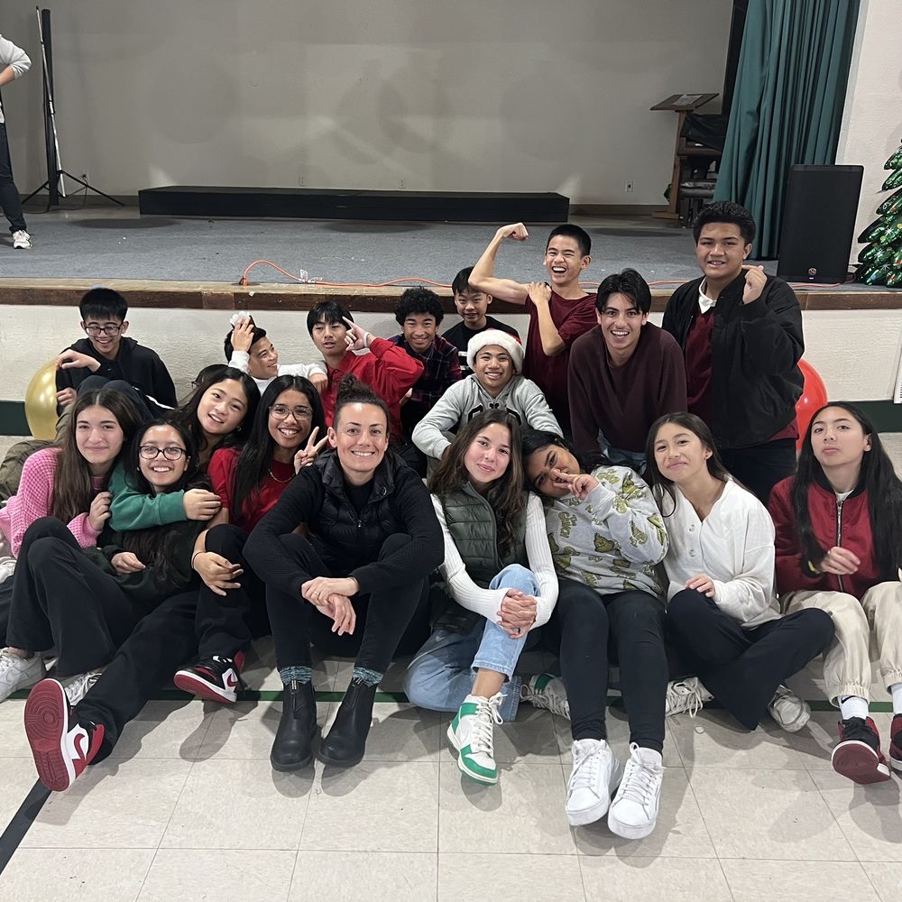 St. Dunstan Catholic School - Kids after their Christmas performance, hanging with one of their favorite teachers! - Elementary Schools Near Me - Millbrae, California St. Dunstan Catholic School - Kids after their Christmas performance, hanging with one of their favorite teachers! - Elementary Schools Near Me - Millbrae, California