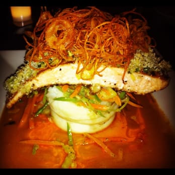 Yard House - Ginger crusted salmon with wasabi mashed potatoes topped with fried carrot strings - New American Near Me - Boca Raton, Florida Yard House - Ginger crusted salmon with wasabi mashed potatoes topped with fried carrot strings - New American Near Me - Boca Raton, Florida