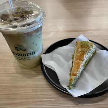 Qamaria Yemeni Coffee - Iced Pistachio with Coconut Milk and Carrot Slice Baklava - Coffee & Tea Near Me - Latham, New York