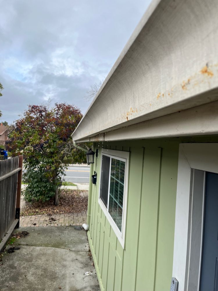 Slide of JB Rain Gutter installation