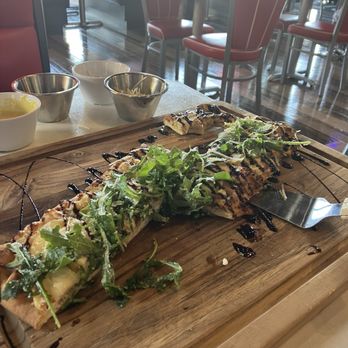 The 12 Wine Bar & Kitchen - Gorgonzola pear flatbread - Wine Bars Near Me - Lincoln, California The 12 Wine Bar & Kitchen - Gorgonzola pear flatbread - Wine Bars Near Me - Lincoln, California