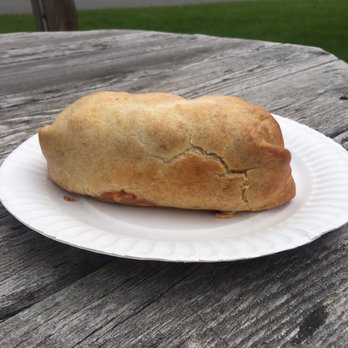Prime Pasty King - a piece of bread on a paper plate - Modern European Near Me - Kingsford, Michigan Prime Pasty King - a piece of bread on a paper plate - Modern European Near Me - Kingsford, Michigan