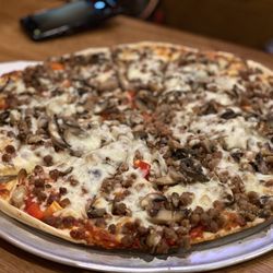 Shotgun Dan's Pizza - 16" pizza with so many toppings! We subbed red bell peppers instead of green.
