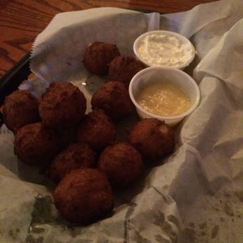 Bubba Gumbo's - Hush puppies with honey butter sauce that's delish - Seafood Near Me - Tybee Island, Georgia Bubba Gumbo's - Hush puppies with honey butter sauce that's delish - Seafood Near Me - Tybee Island, Georgia