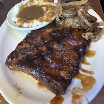 Texas Roadhouse - Texas size combo: 6 nice Sirloin with mushroom and onions & Ribs with mash potatoes and gravy - Steakhouses Near Me - Hendersonville, Tennessee