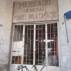 Mercado Santa Tere - En esta entrada por la tarde/noche un señor vende calabaza dulce, camote dulce y camote tatemado.
