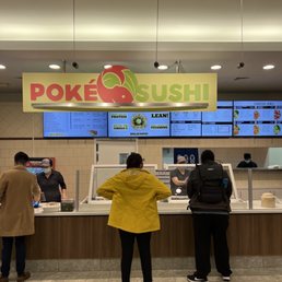 people ordering food at the counter people ordering food at the counter