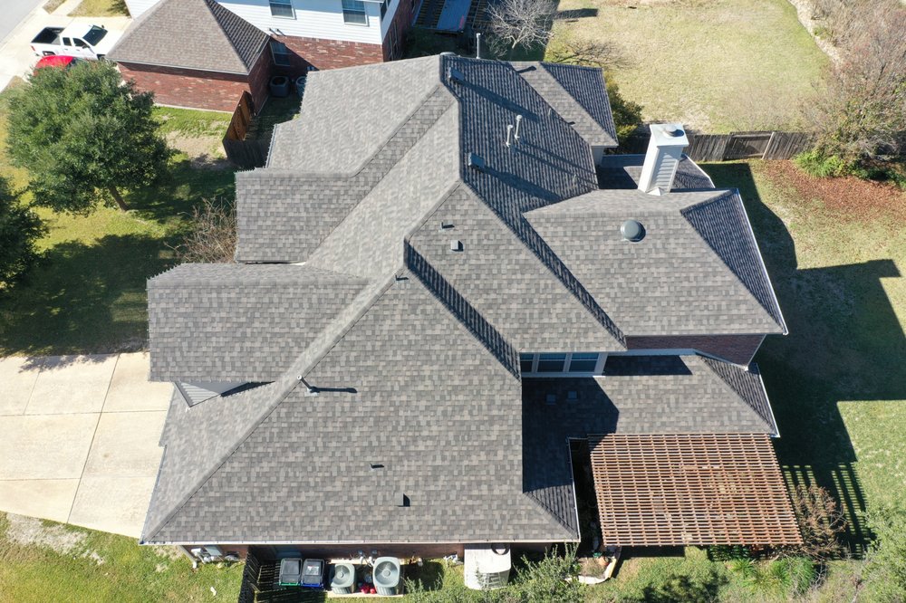 Slide of Otis Roofing