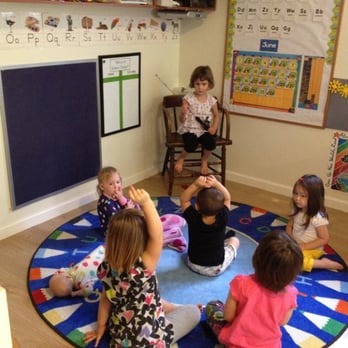 Forever Young Daycare - A child leading "Show and Share" during our daily Circle Time. Great opportunity to build language and conversation skills. - Child Care & Day Care Near Me - Mountlake Terrace, Washington Forever Young Daycare - A child leading "Show and Share" during our daily Circle Time. Great opportunity to build language and conversation skills. - Child Care & Day Care Near Me - Mountlake Terrace, Washington