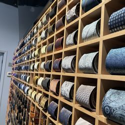 Grant’s Menswear - Tie and Custom Belt Wall
