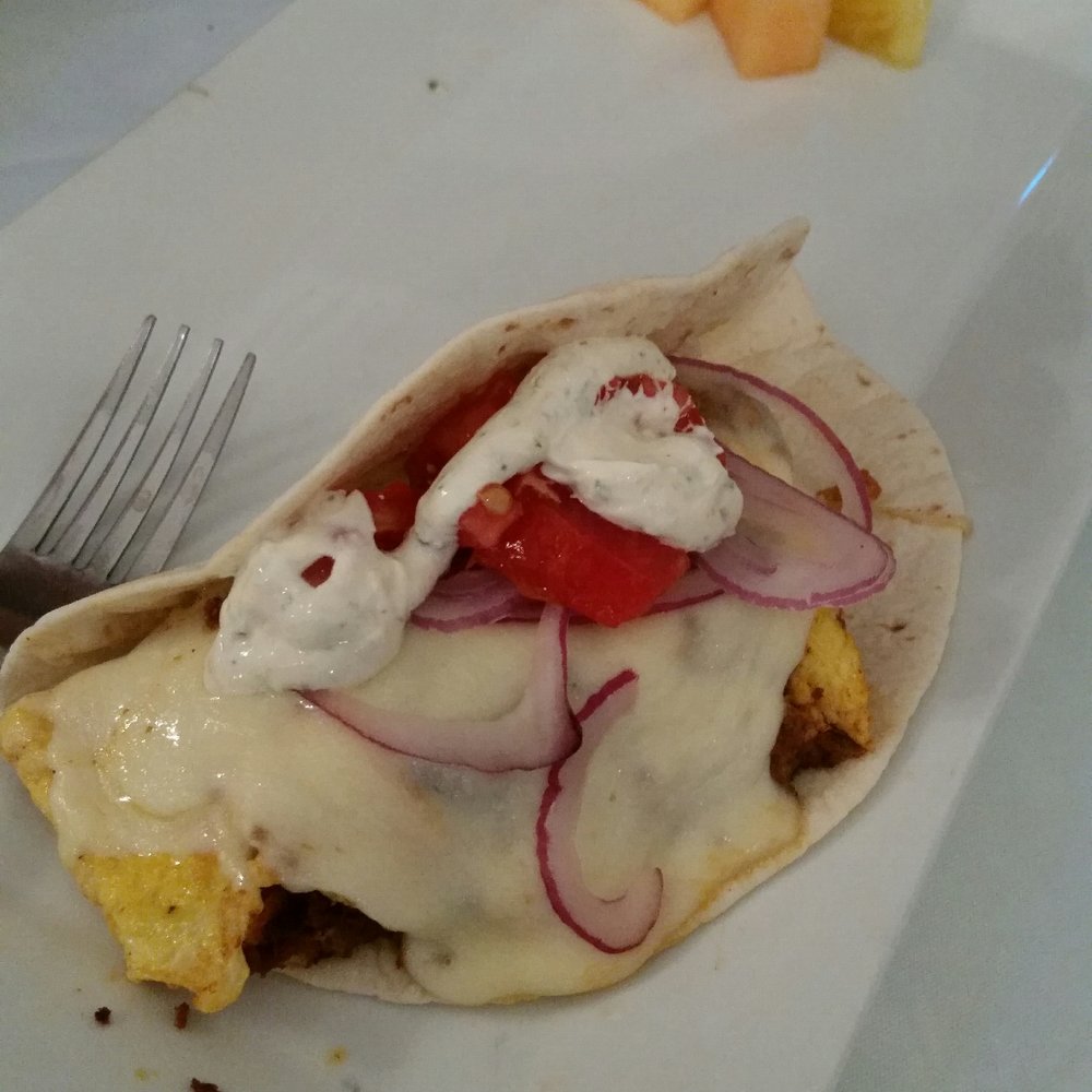 Upper Crust Cafe & Bakery - Huevos Rancheros are delicious, it's comes with 2. 1 was already consumed haha! Very delicious! - American Near Me - Venice, Florida