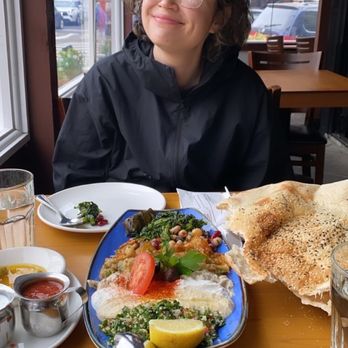 Istanbul Bay - Cold appetizer sampler- eggplant in tomato sauce, Babaganoush, Stuffed Grape Leaves, Tabuli, labneh, hummus, mixed beans and more - Turkish Near Me - Brooklyn, New York