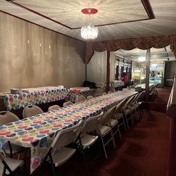 Hamburg Palace - Party tables and chairs for food and cake.