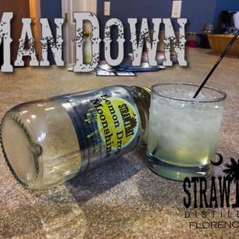 Straw Hat Distillery - a glass of gin and a bottle of gin - Distilleries Near Me - Florence, South Carolina