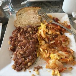 Corned Beef Hash and 2 Eggs with potatoes