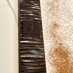 Margo's Fine Chocolate - Signature handmade chocolate by Margo's Fine Chocolate.
Milk chocolate with coffee.