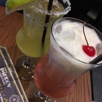 Miami Improv Comedy Club and Dinner Theater - Cadillac margarita and some other kinda of drink with a Pina colada floater, yum - Comedy Clubs Near Me - Doral, Florida Miami Improv Comedy Club and Dinner Theater - Cadillac margarita and some other kinda of drink with a Pina colada floater, yum - Comedy Clubs Near Me - Doral, Florida
