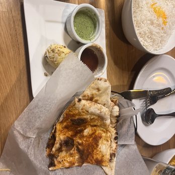 Black Salt - Black salt naan bread bread with cucumber dip - Indian Near Me - Chesterfield, Missouri Black Salt - Black salt naan bread bread with cucumber dip - Indian Near Me - Chesterfield, Missouri