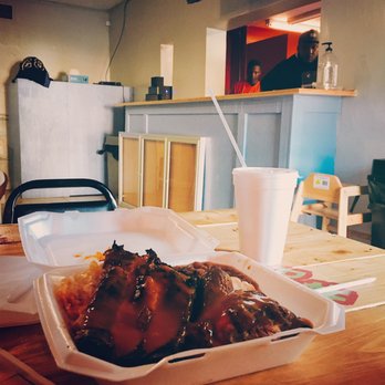 Konan BBQ - Ribs and chicken with 2 sides. The staffs behind the counter are so attentive and friendly. - Barbeque Near Me - Tampa, Florida
