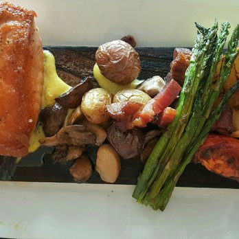Six Seven Restaurant - Cedar plank salmon - New American Near Me - Seattle, Washington Six Seven Restaurant - Cedar plank salmon - New American Near Me - Seattle, Washington