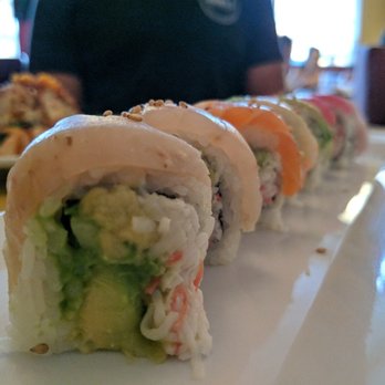 Sushi Town - rainbow roll: california roll topped with 5 kinds of fish + avocado = $8.99 - Japanese Near Me - Costa Mesa, California