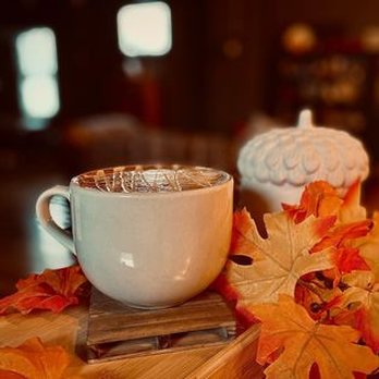 The Promise Blend - a cup of coffee on a table with autumn leaves - Coffee & Tea Near Me - New Brighton, Pennsylvania The Promise Blend - a cup of coffee on a table with autumn leaves - Coffee & Tea Near Me - New Brighton, Pennsylvania