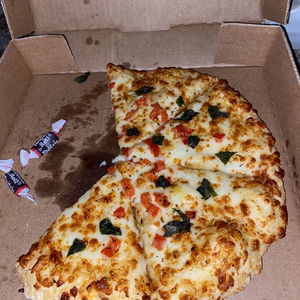HotBox Pizza - a half eaten pizza in a box - Pizza Near Me - Avon, Indiana HotBox Pizza - a half eaten pizza in a box - Pizza Near Me - Avon, Indiana