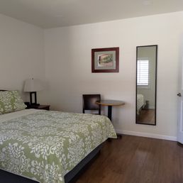 Room with a queen size bed