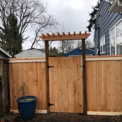 The Original Fence Company - Picture frame style fence complete with a walk gate and decorative trellise!