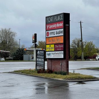 Specialty Market - Entrance to shopping center. - Grocery Near Me - Midvale, Utah