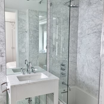 Clever Home - a clean bathroom with a glass shower - General Contractors Near Me - Marietta, Georgia